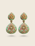 Mint green enamel drop earrings with lotus floral design, kundan stone embellishments, and traditional Indian craftsmanship.
