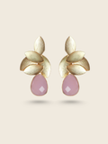 Elegant gold-toned leaf design earrings with pink teardrop stones, perfect for a chic and modern ethnic look.